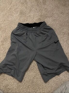 Nike Gray Athletic Shorts with Black Swoosh